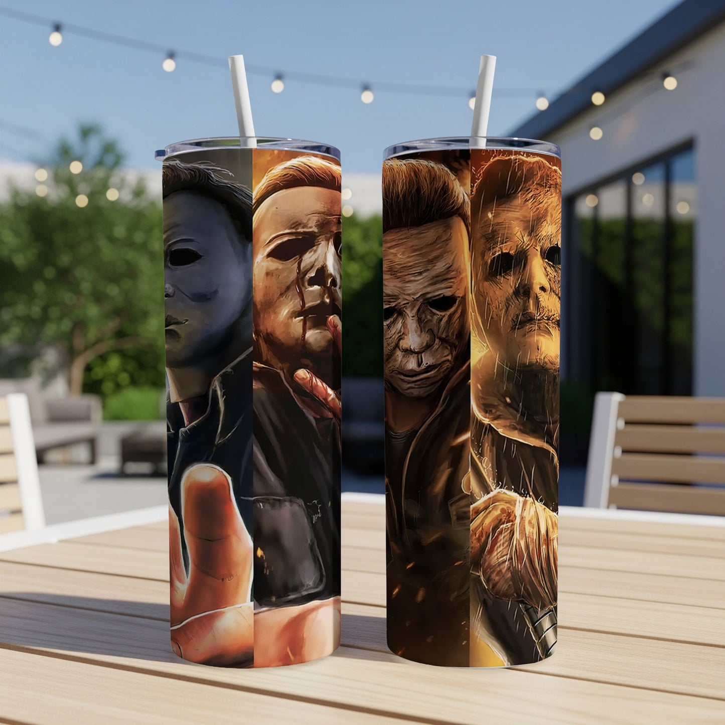 Michael Myers collage on two tumblers with straws on a table.