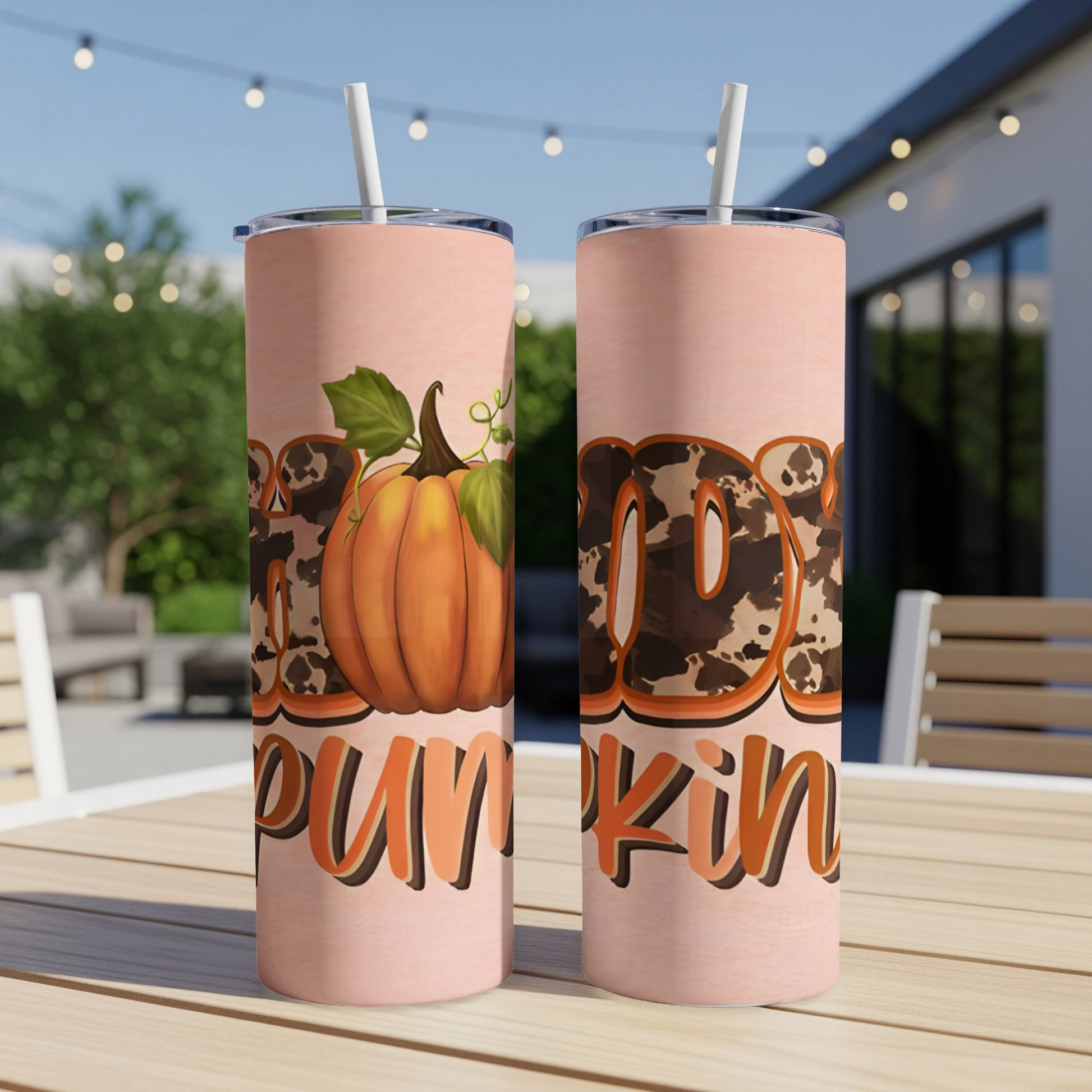 Two tall tumblers with "Happy Pumpkin" text and pumpkin graphic.