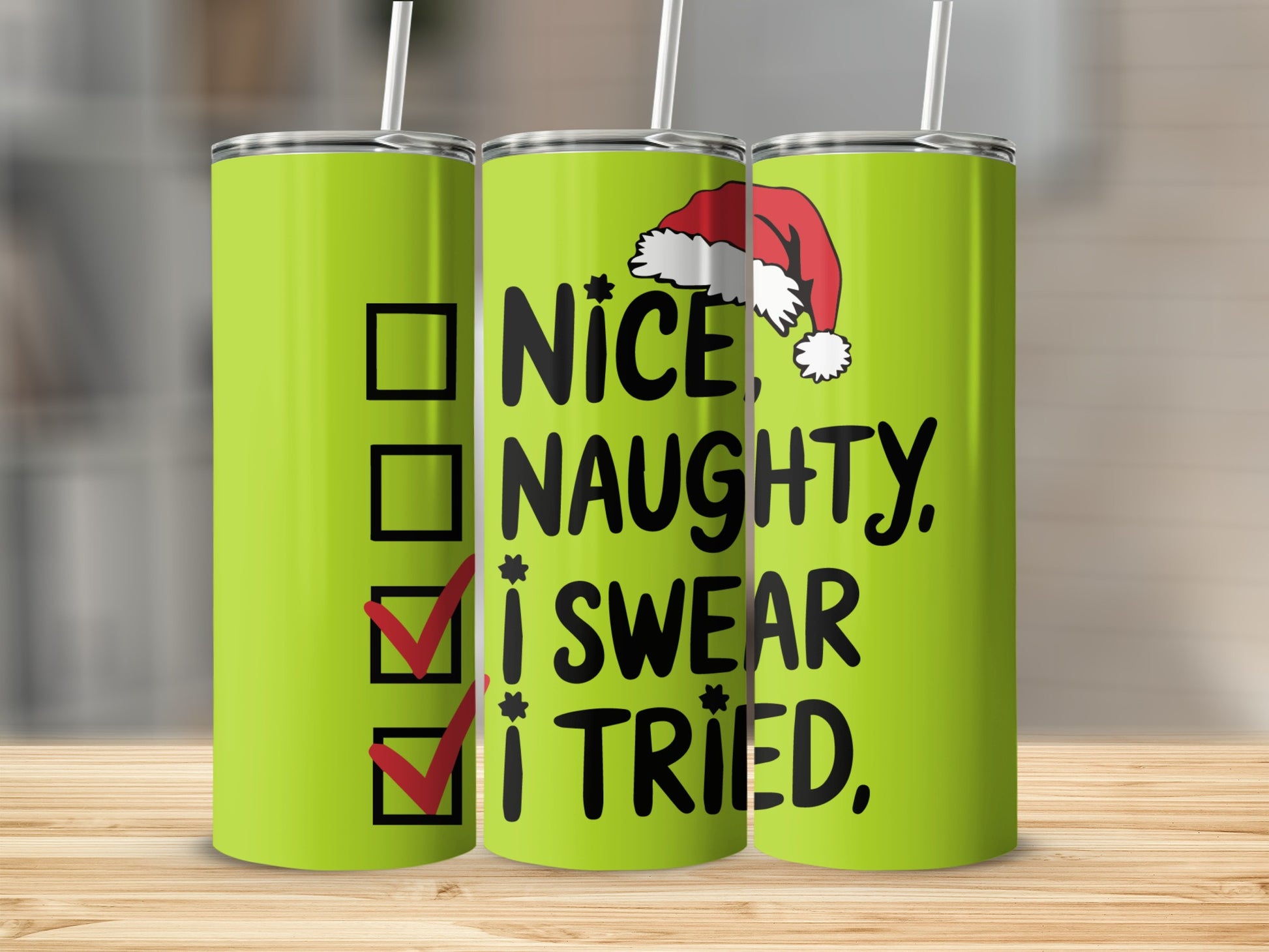 Green tumbler with Christmas themed "Nice, Naughty, I swear I tried" checklist design.