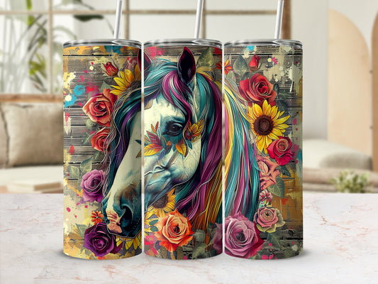 Tumbler featuring a colorful horse head with floral accents on a wood-grain background.