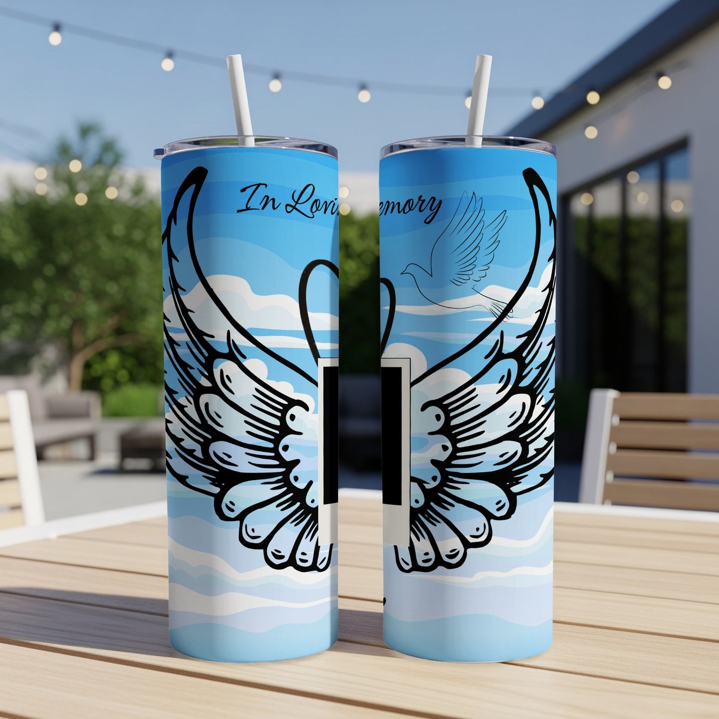 Two tumblers with "In Loving Memory" and angel wings design.