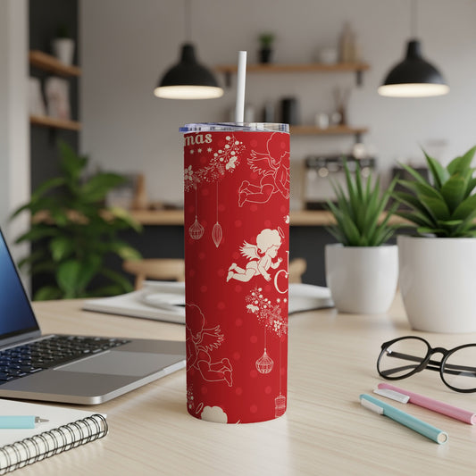 Red Christmas tumbler with white angels and ornaments.