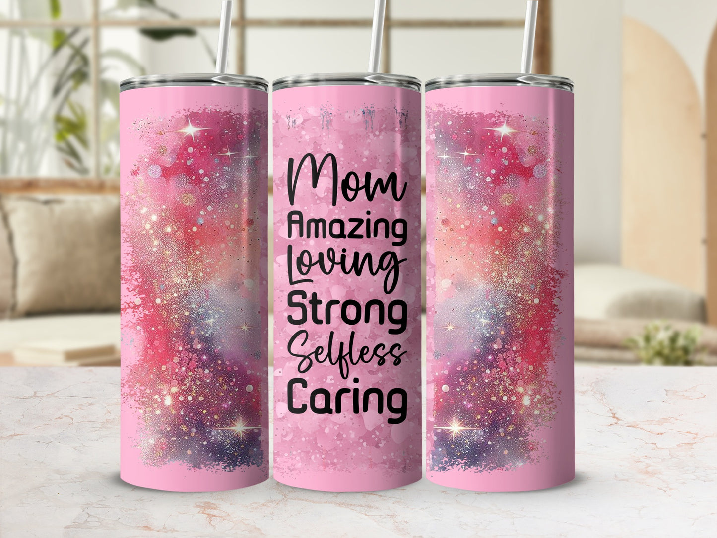 Pink tumbler with "Mom Amazing Loving Strong Selfless Caring" text and glitter accents.