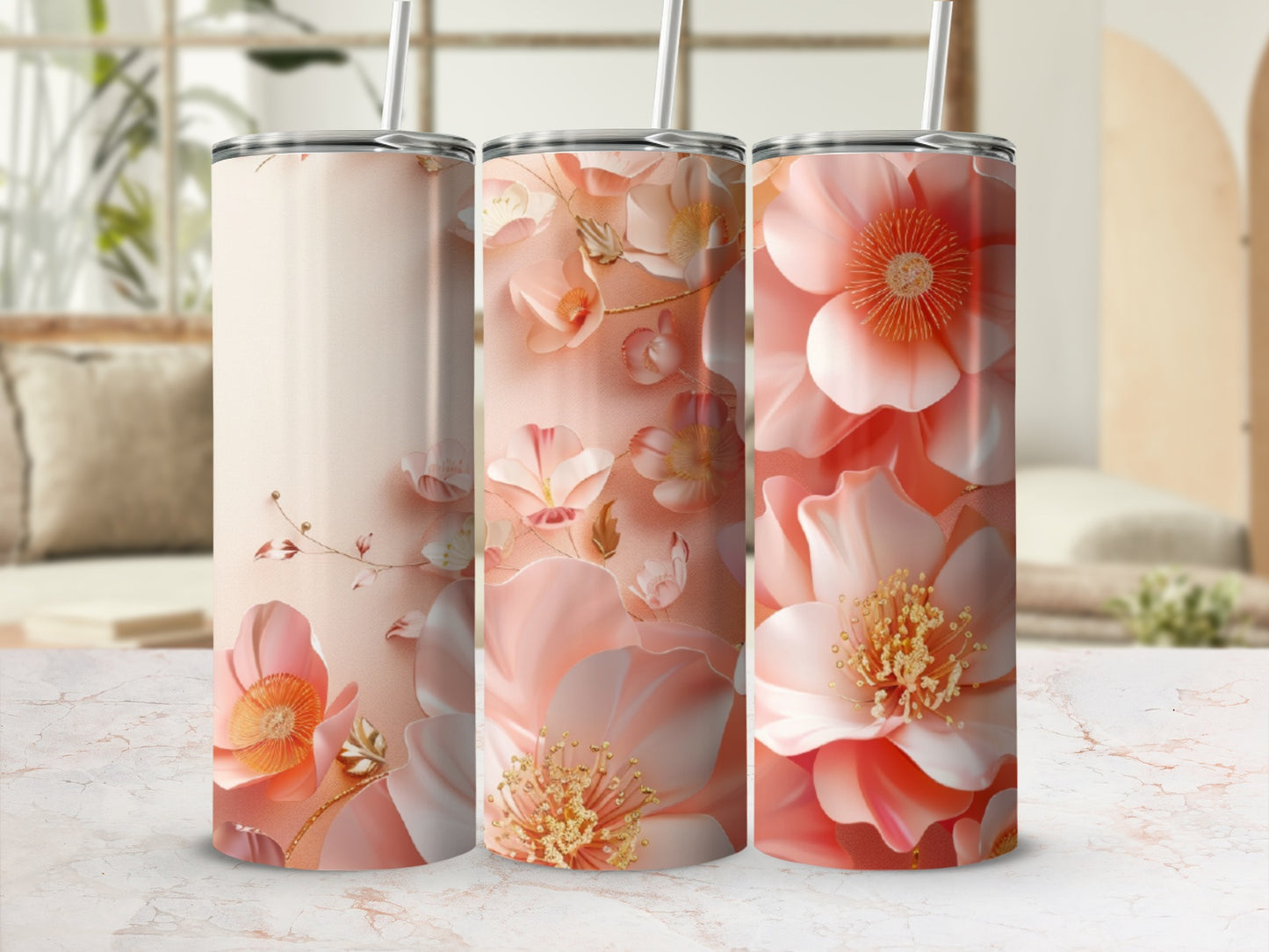 Triptych of tumblers featuring delicate pink floral designs with gold accents.