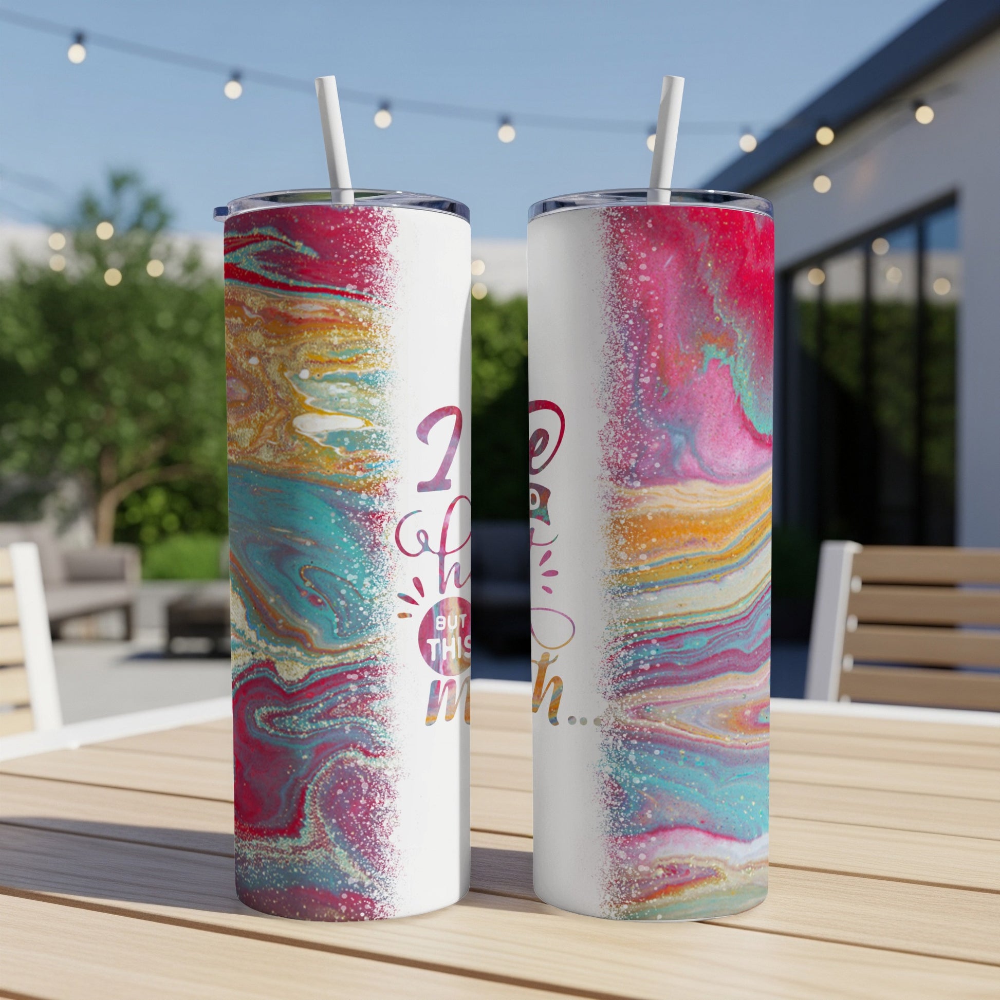 Two tumblers with colorful marbled patterns and text that says "I hope but this much..."
