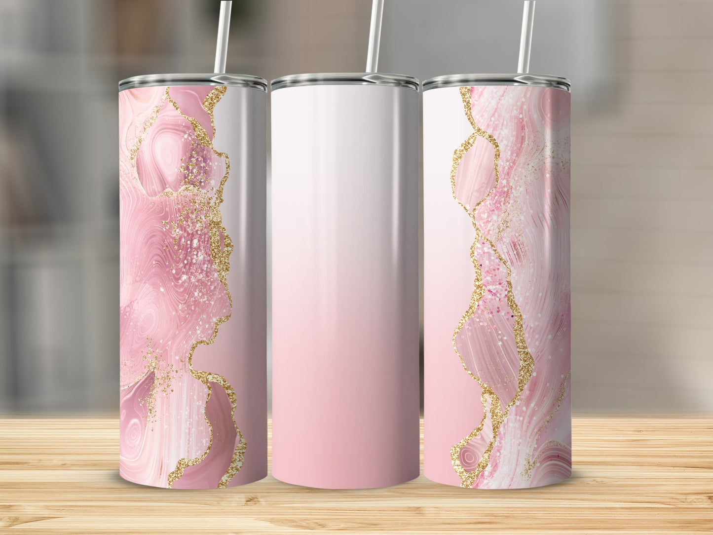 Pink marble tumbler with gold glitter accents and white lid.