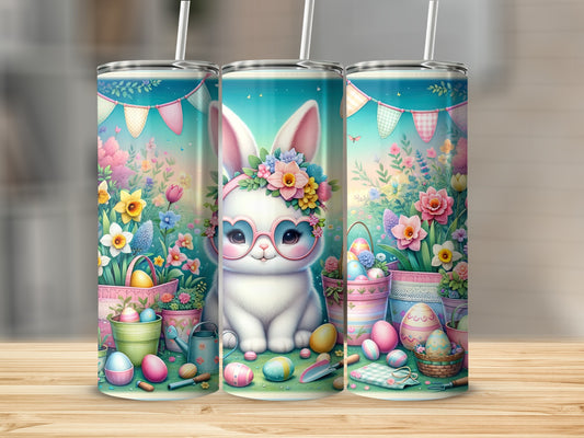 Easter bunny with flowers and Easter eggs on a tumbler.