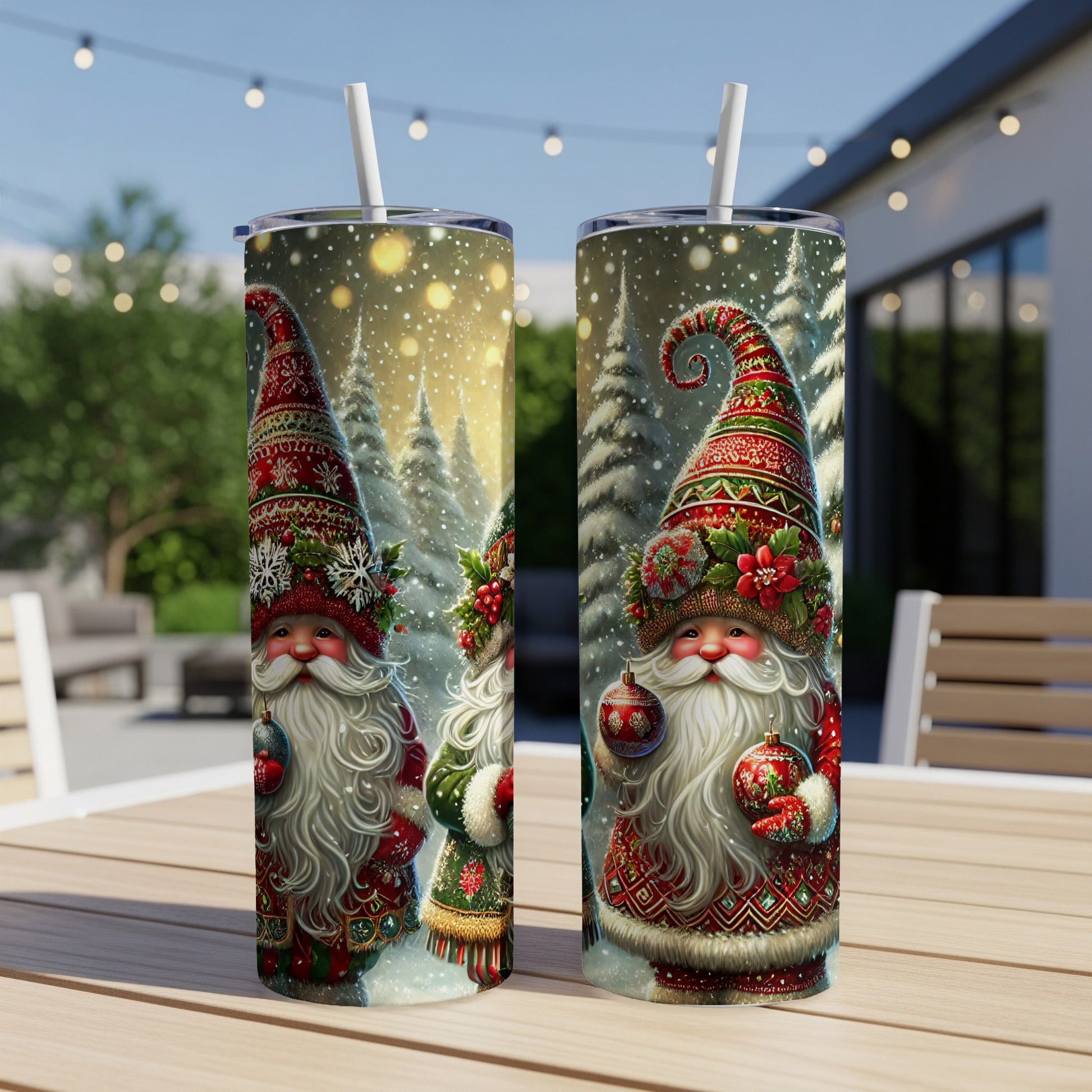 Two tumblers with festive gnomes, snowflakes, and pine trees against a bokeh background.