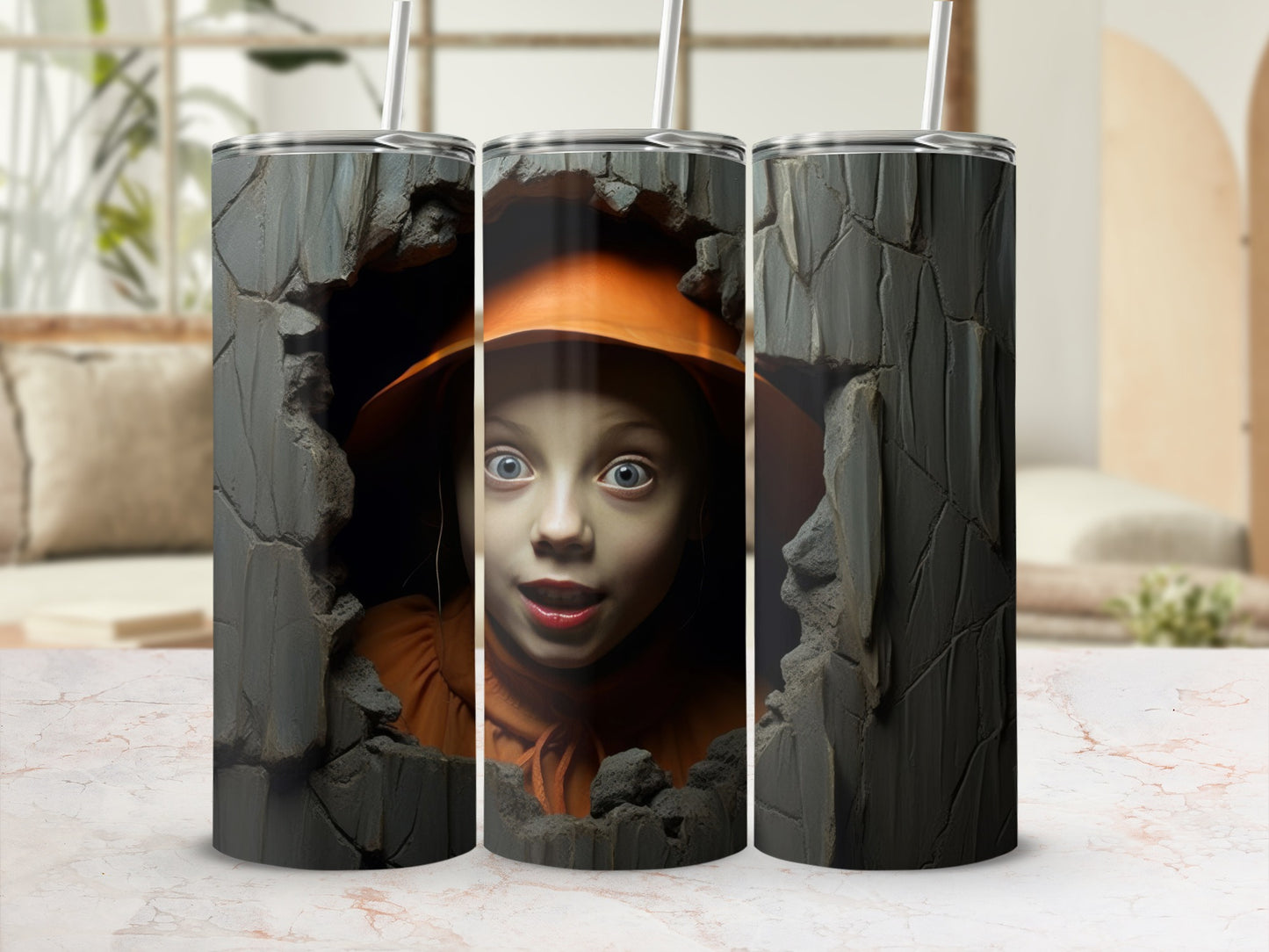 Three tumblers with a cracked stone design framing a girl in an orange hat.