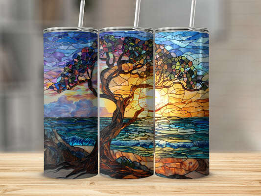 Three tumblers display stained-glass art of a tree by the ocean at sunset.