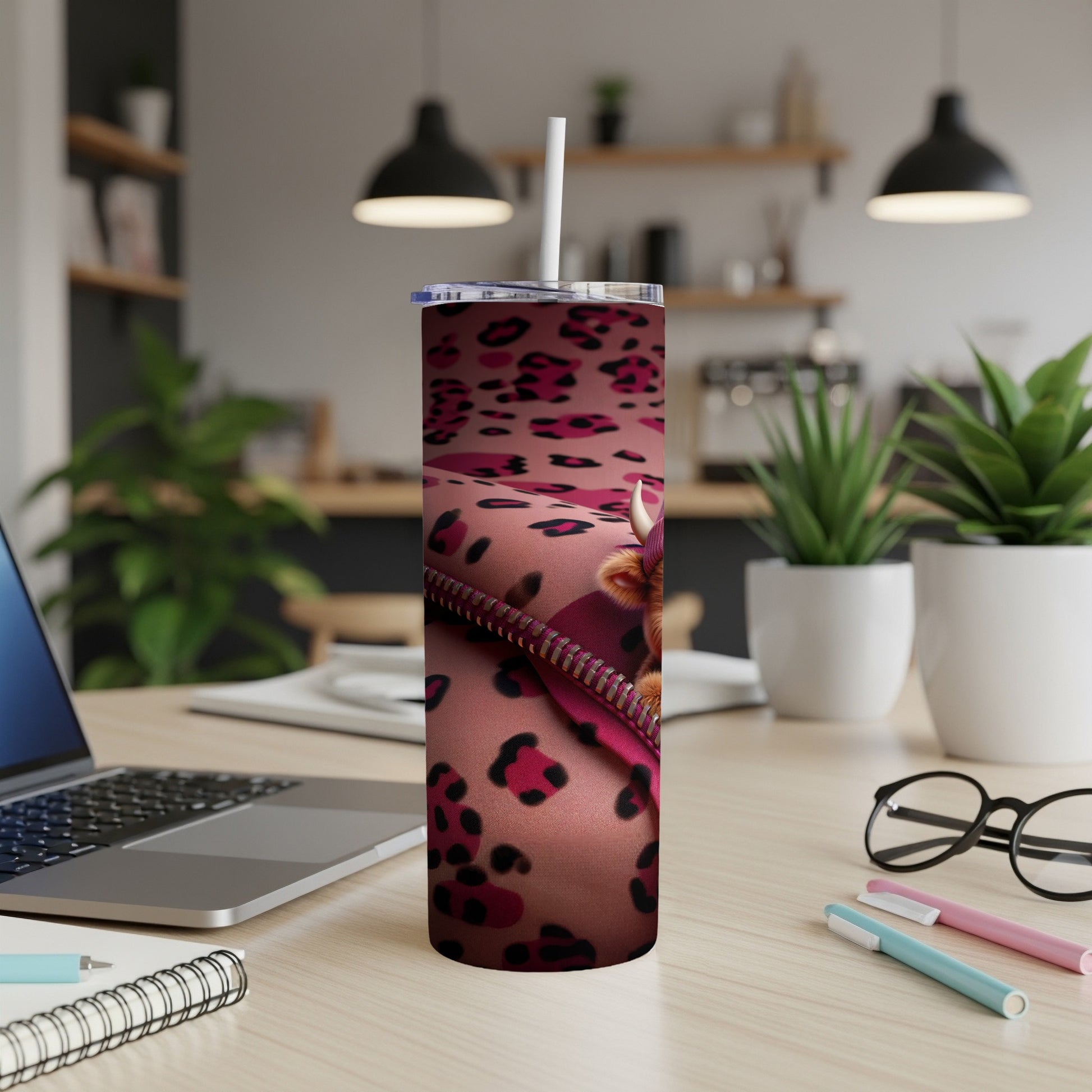 Leopard print tumbler with a bull head peeking out of a zipper.