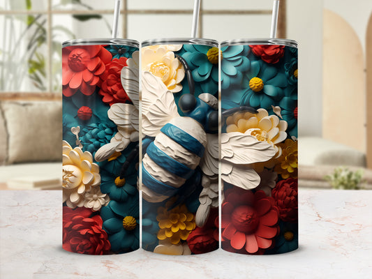 Bee and floral pattern on a tumbler with straw.