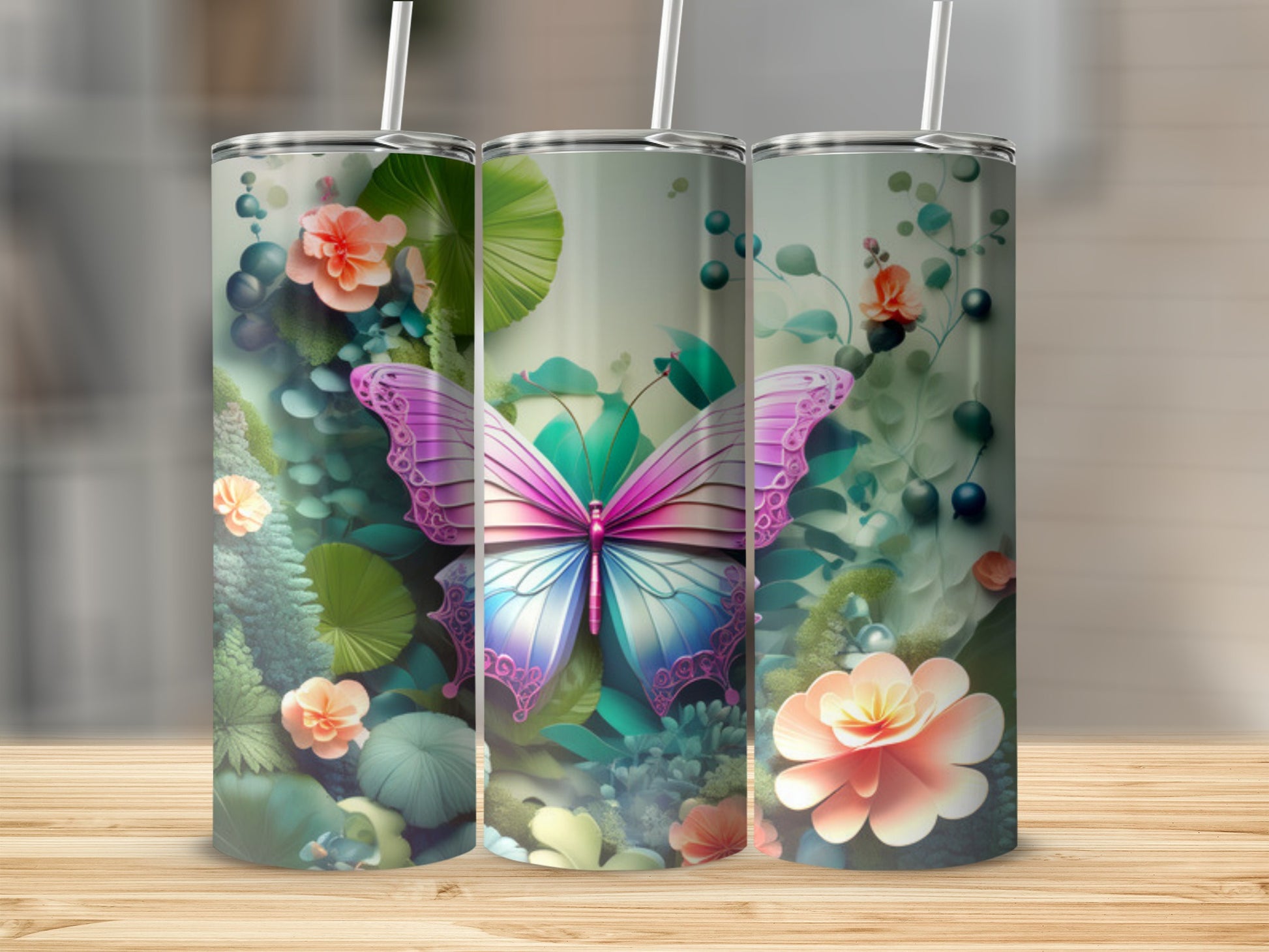 Three tumblers with a vibrant butterfly and floral design.