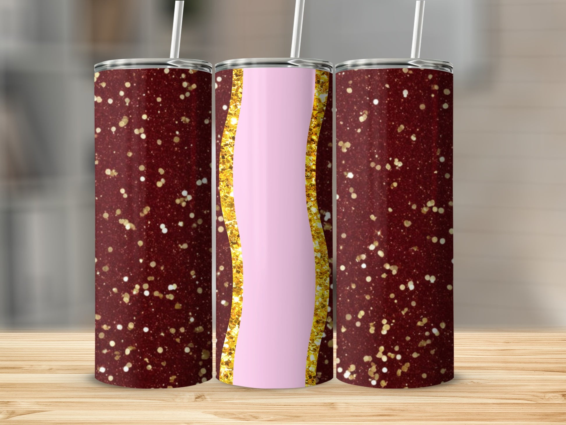 Three glitter tumblers with red, pink, and gold accents.