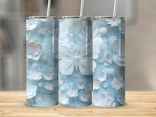 Light blue tumbler with embossed butterflies and flowers.