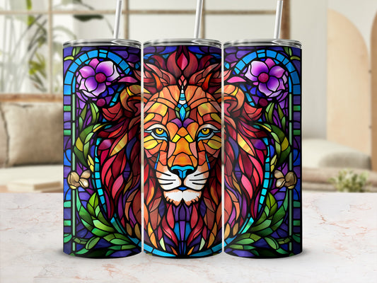 Stained glass lion design on three tumblers with straws.