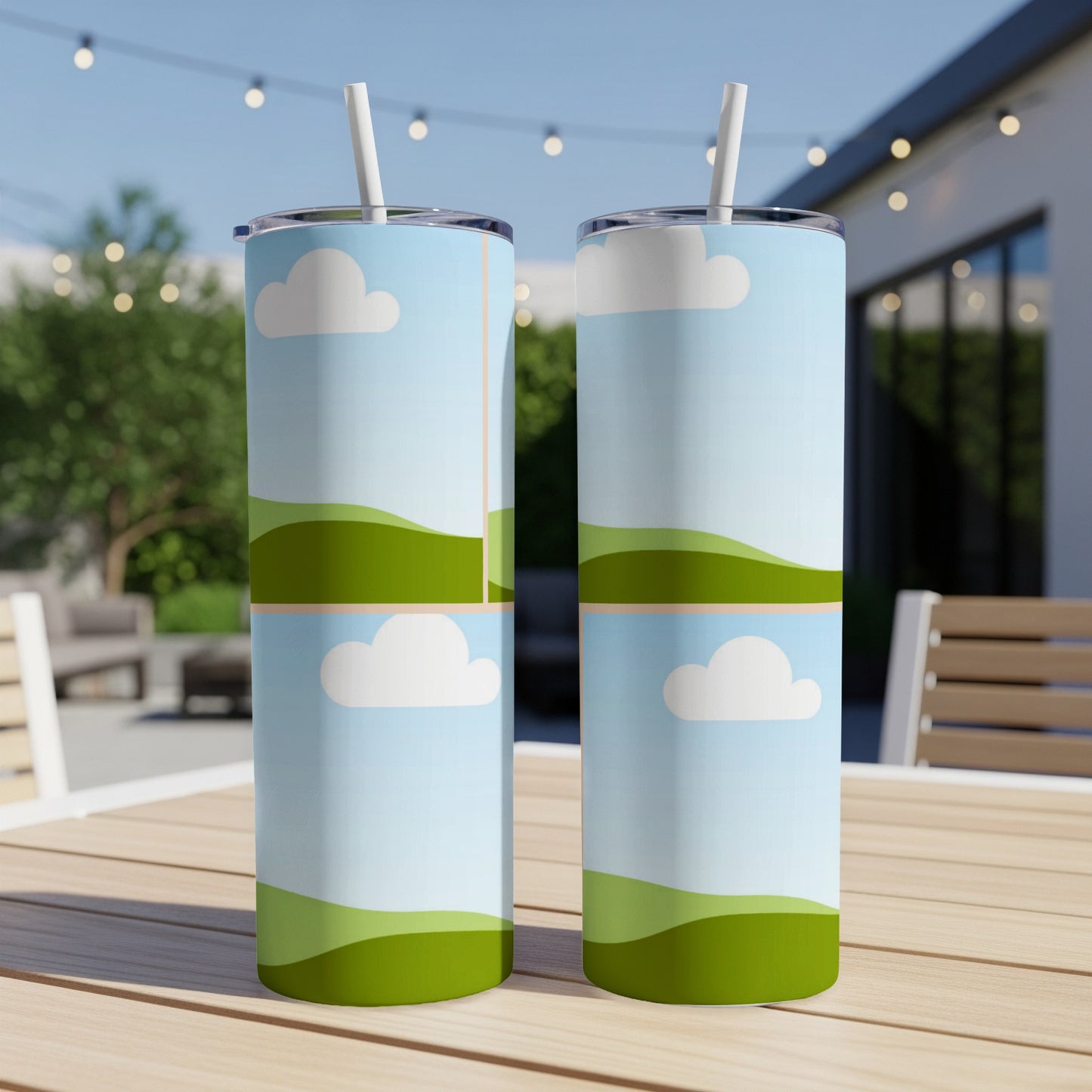 Two tumblers with a pastel sky, cloud, and rolling green hills design.