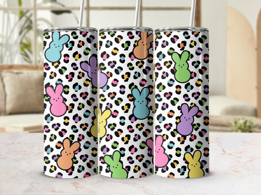 Three tumblers with a colorful bunny and leopard print design.