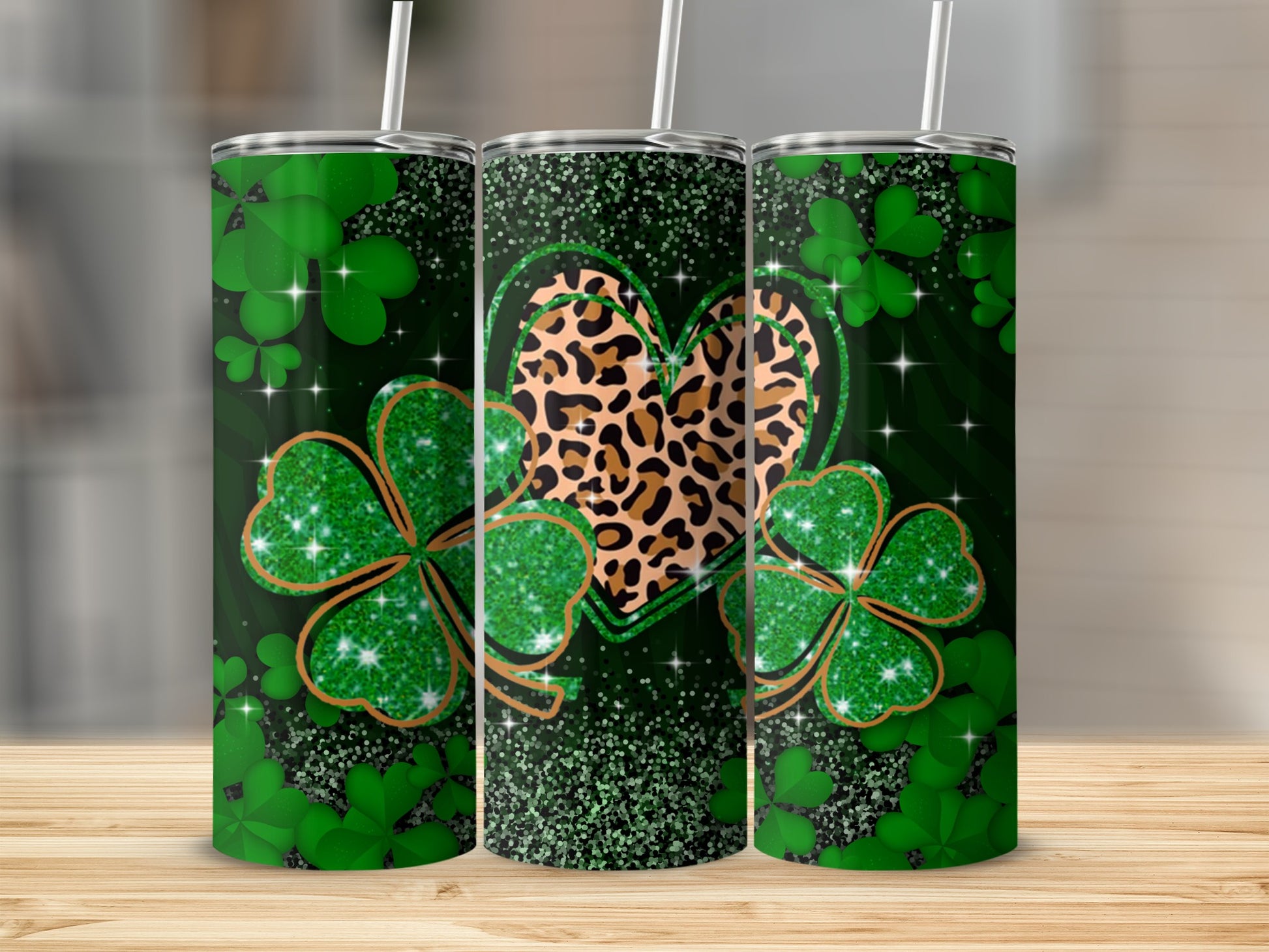 Green shamrocks, leopard print heart, and glitter on a themed tumbler.