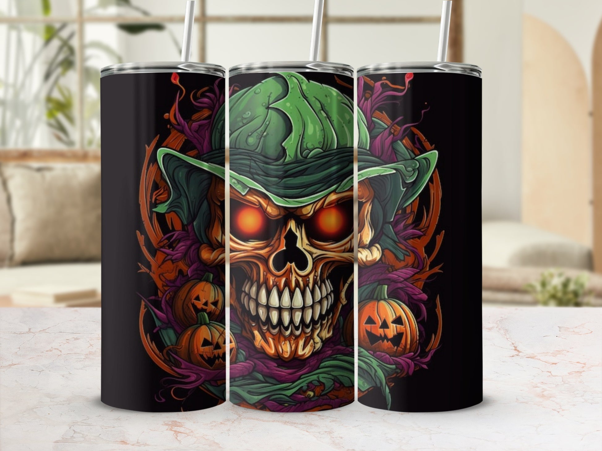 Three tumblers with a Halloween-themed skull, pumpkins, and vines design.