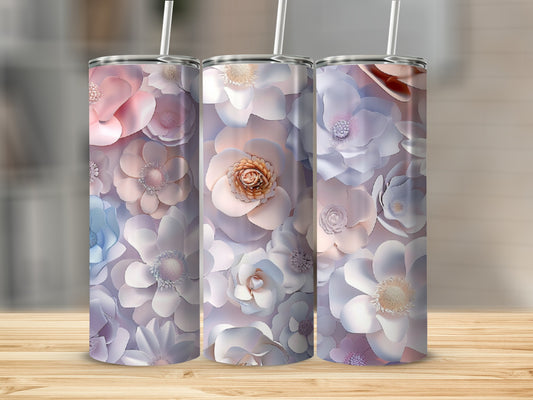 Three tumblers decorated with pastel floral patterns.