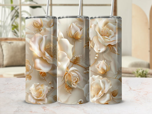 Three tumblers with a floral rose design and gold accents.