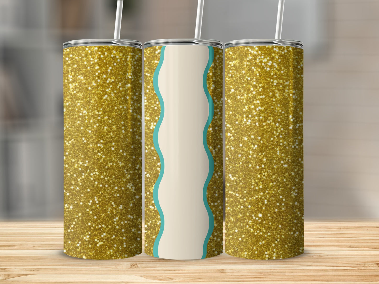 Three glitter tumblers with straws on a wooden surface.