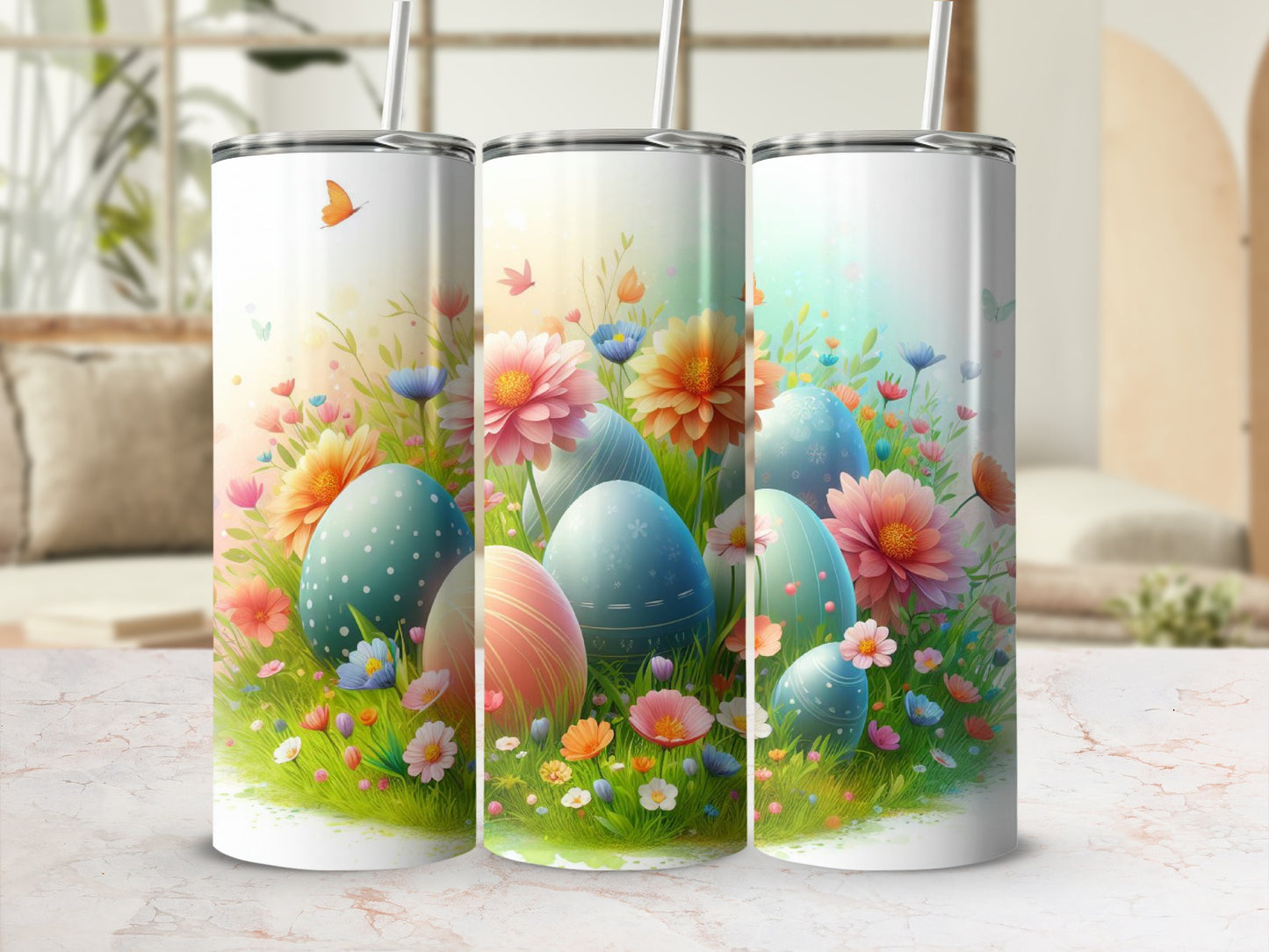 Three tumblers with floral and Easter egg designs.