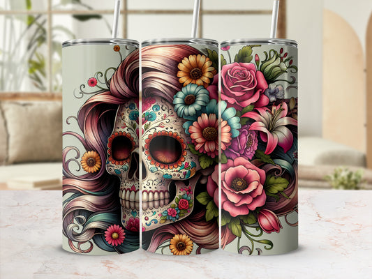 Sugar skull with flowers and long, colorful hair on a tumbler.