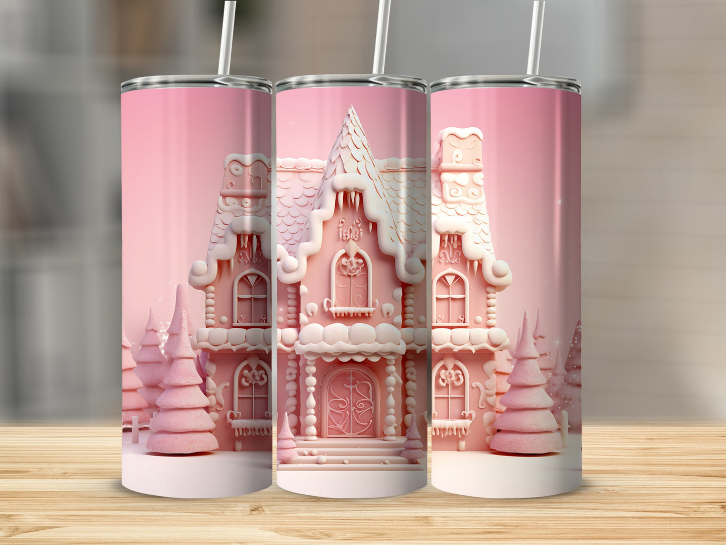 Pink gingerbread house tumbler with frosted trees.