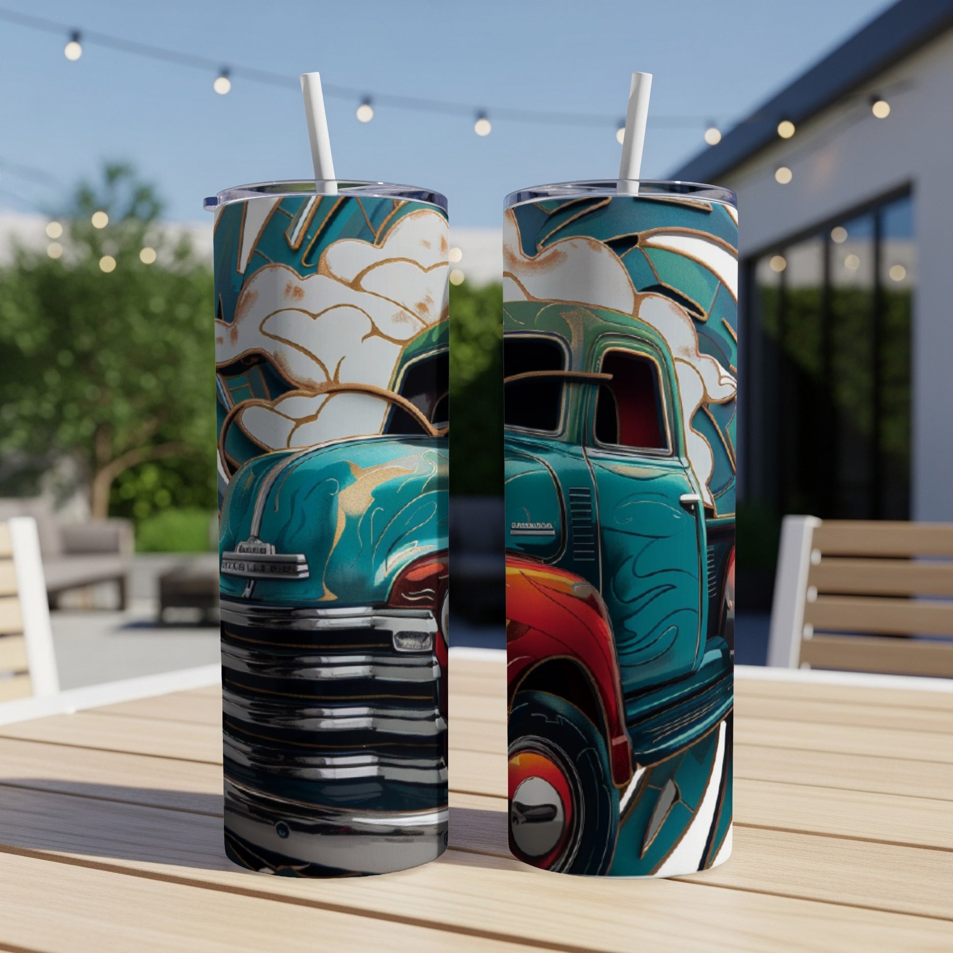 Teal and red vintage truck graphic on two tumblers on a wooden table.