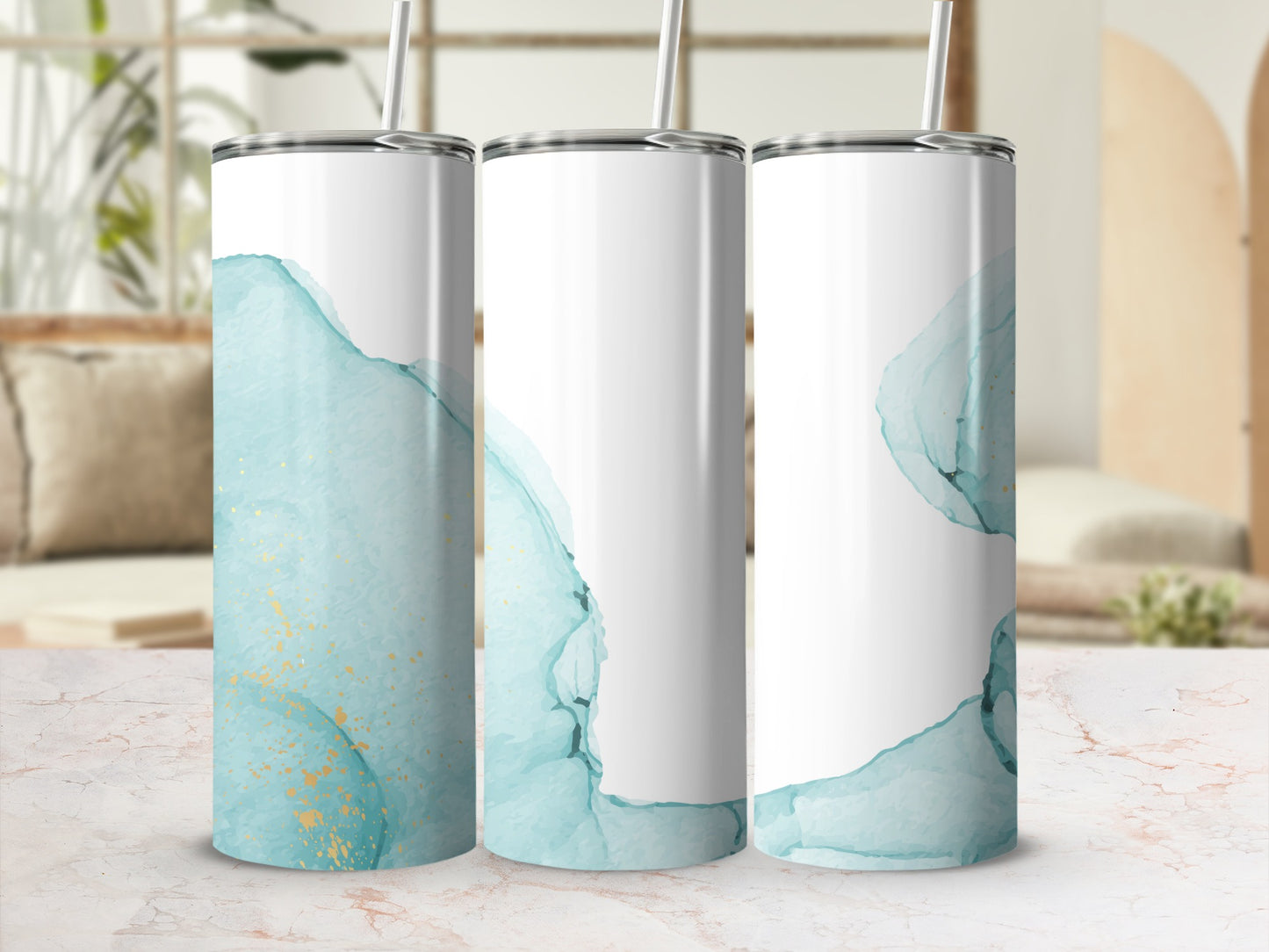 Three tumblers with abstract teal and gold watercolor designs.