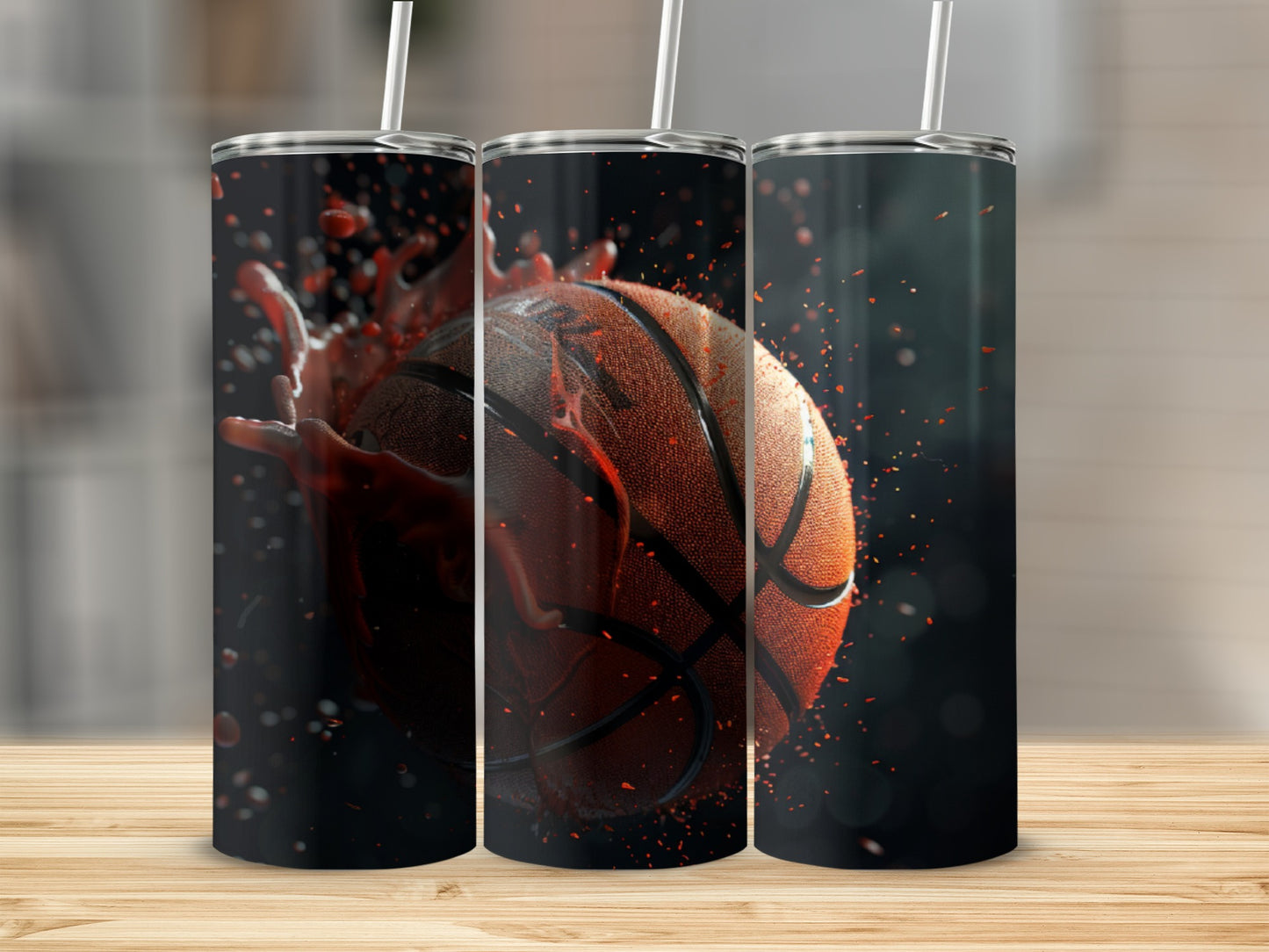Three tumblers show a basketball splashing liquid, set against a blurred background.