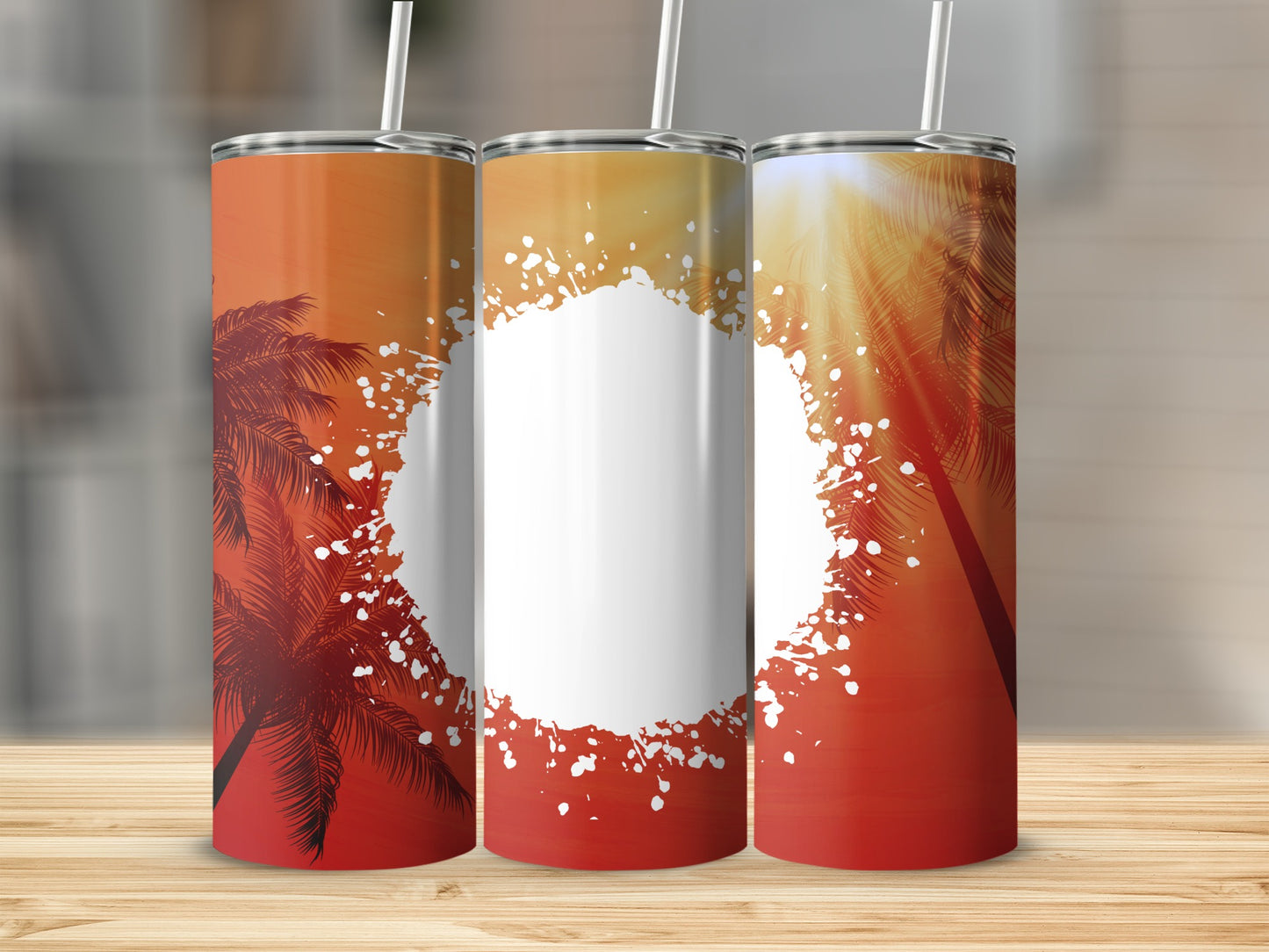 Three tumblers with palm trees and sunset gradient designs.