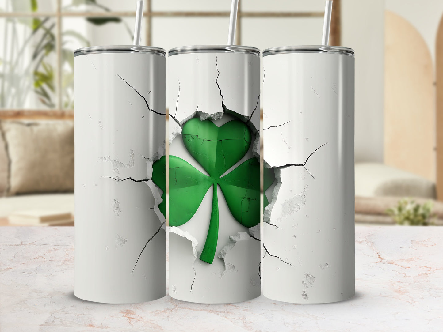 Three white tumblers with a cracked surface revealing a green shamrock.