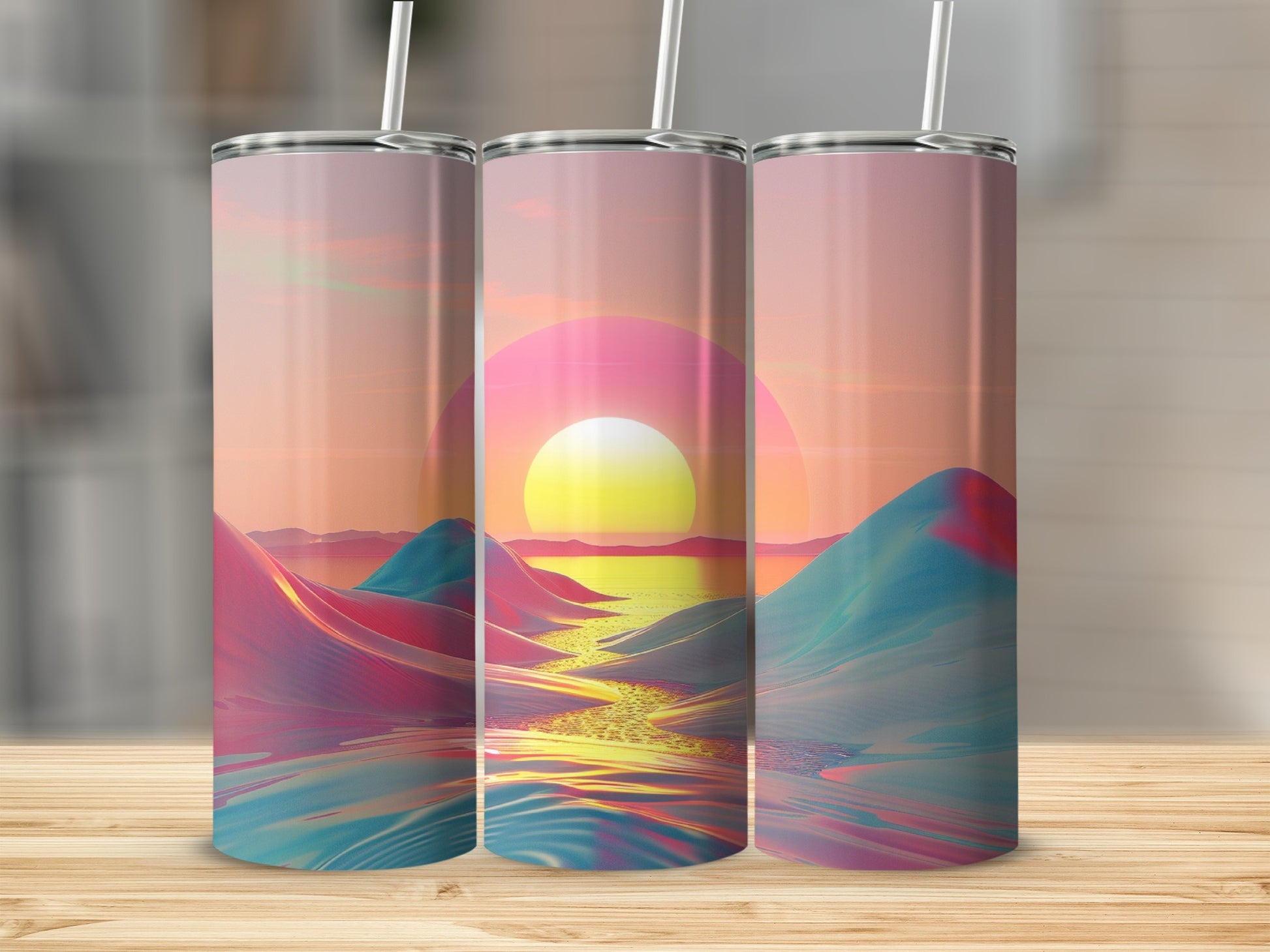 Three abstract landscape tumblers with a sunset and pastel mountains.