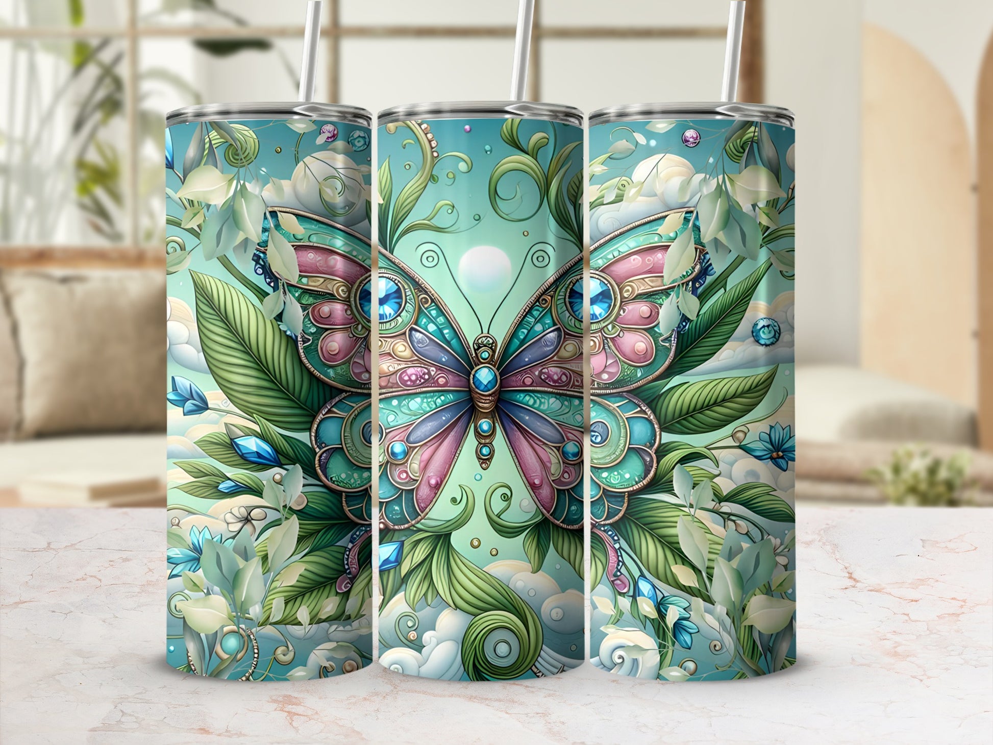 Three tumblers with iridescent butterfly and floral designs.