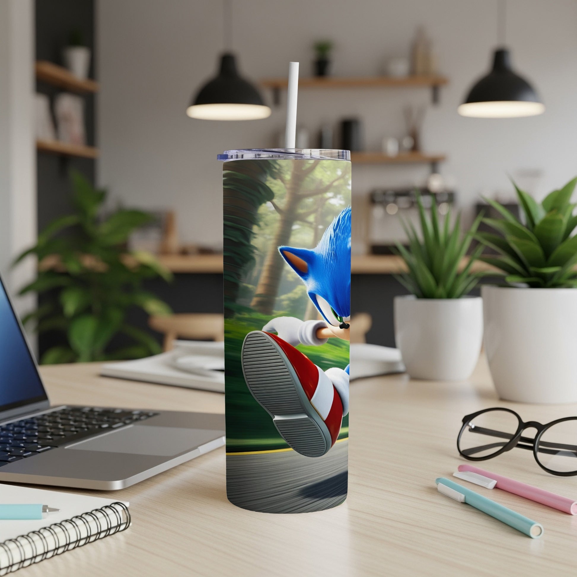 Sonic the Hedgehog running with a straw in a tumbler on a desk.