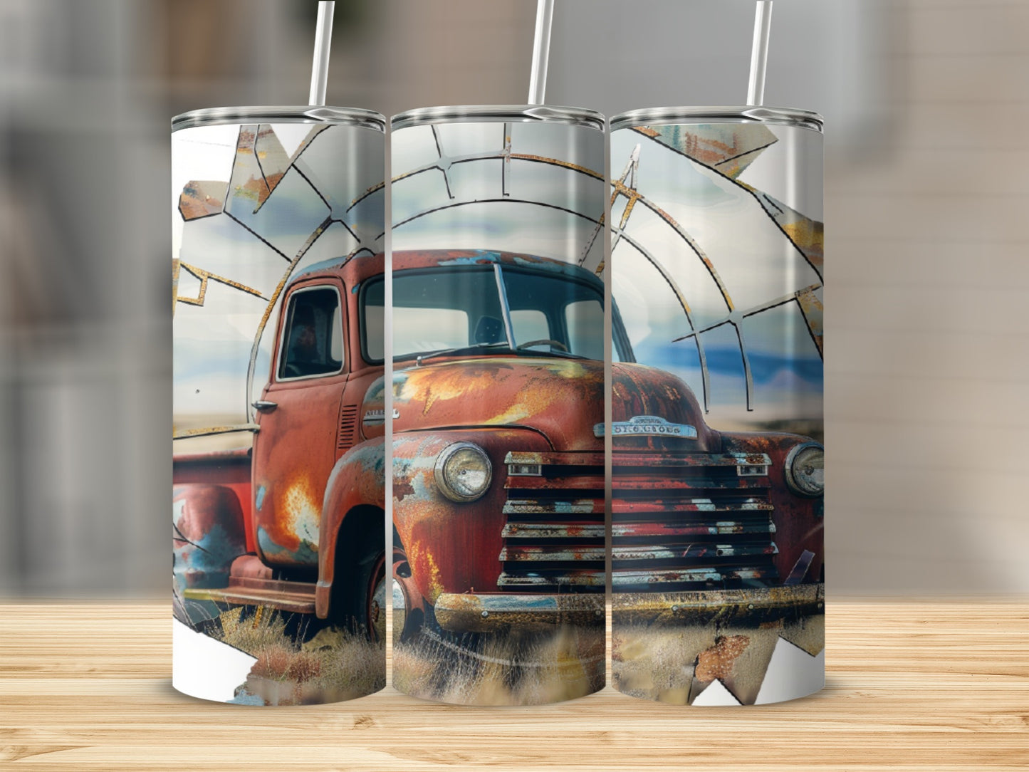 Rusty vintage truck with windmill behind it on a tumbler.