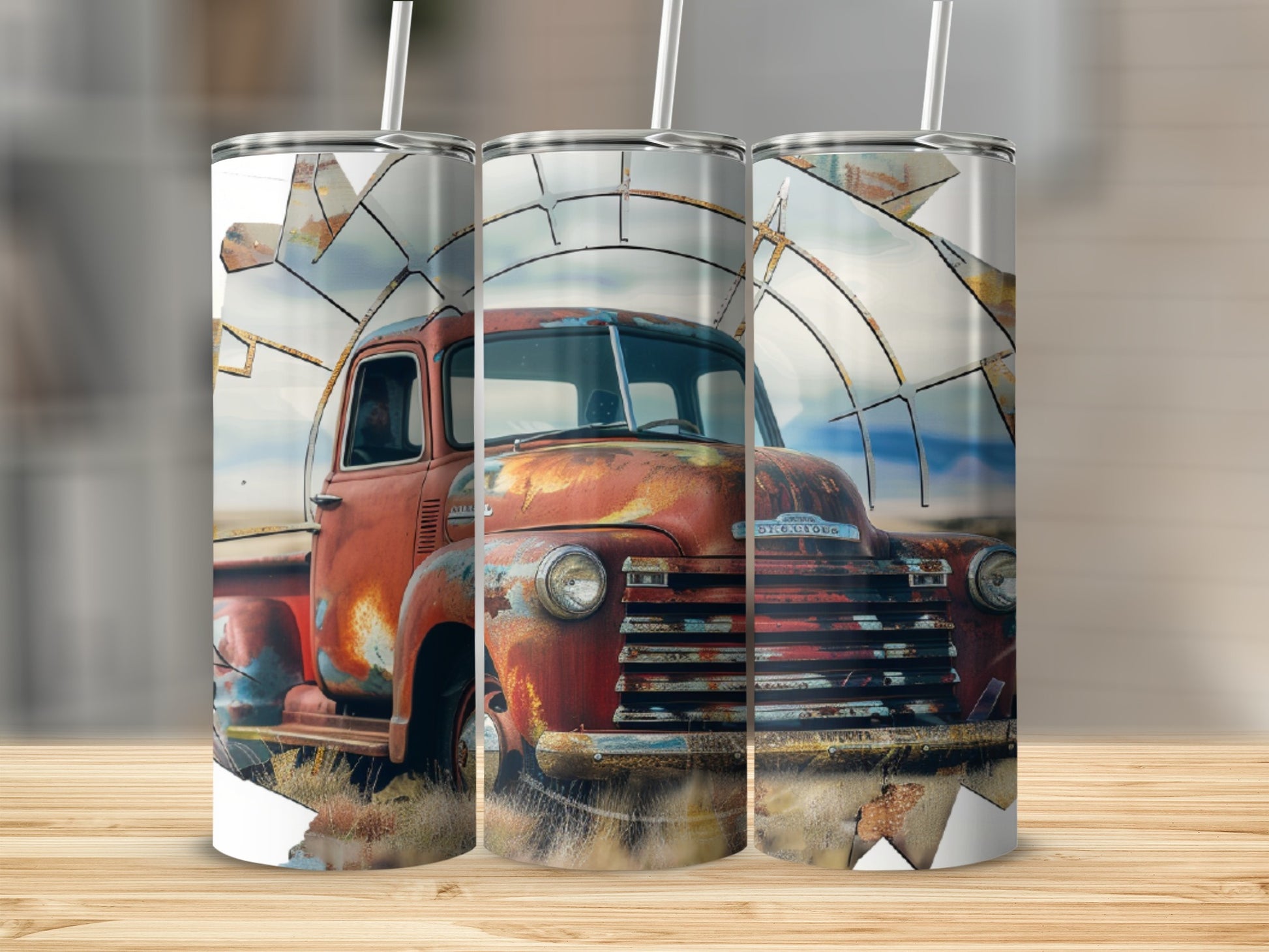 Rusty vintage truck with windmill behind it on a tumbler.