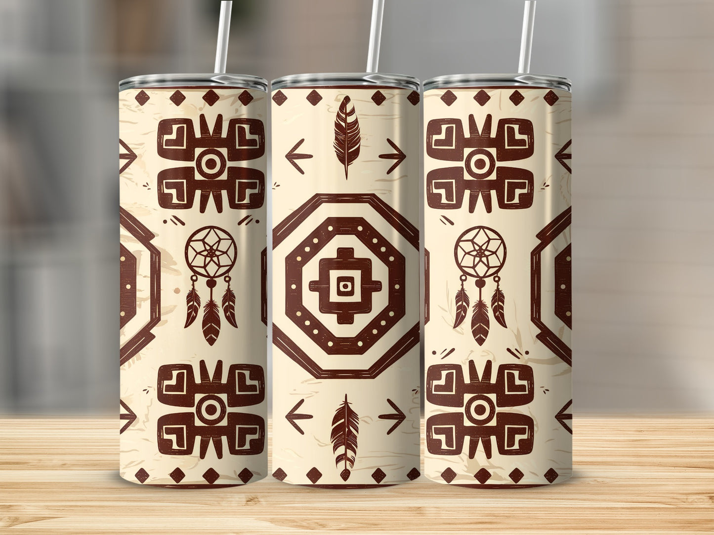 Three tumblers with geometric Native American-inspired patterns.