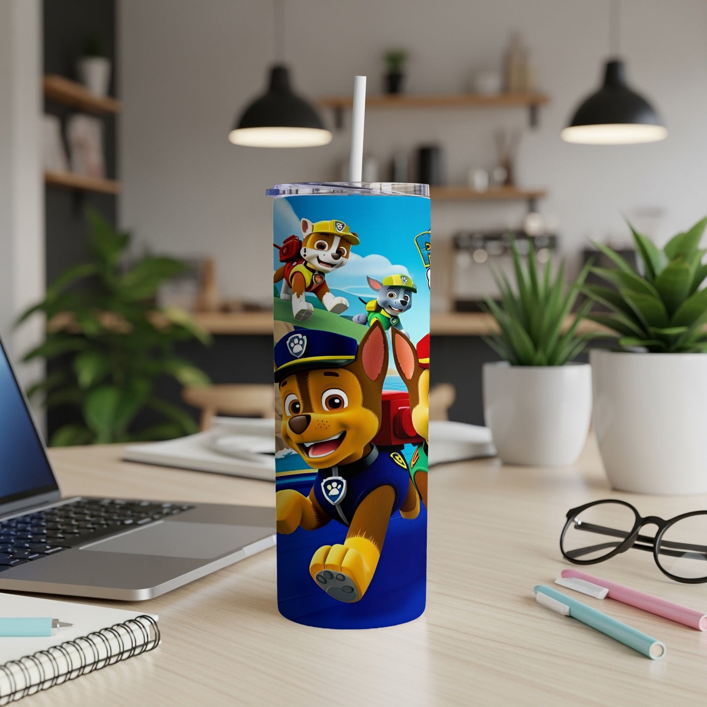 Paw Patrol characters Marshall, Chase, and Rubble on a blue tumbler.