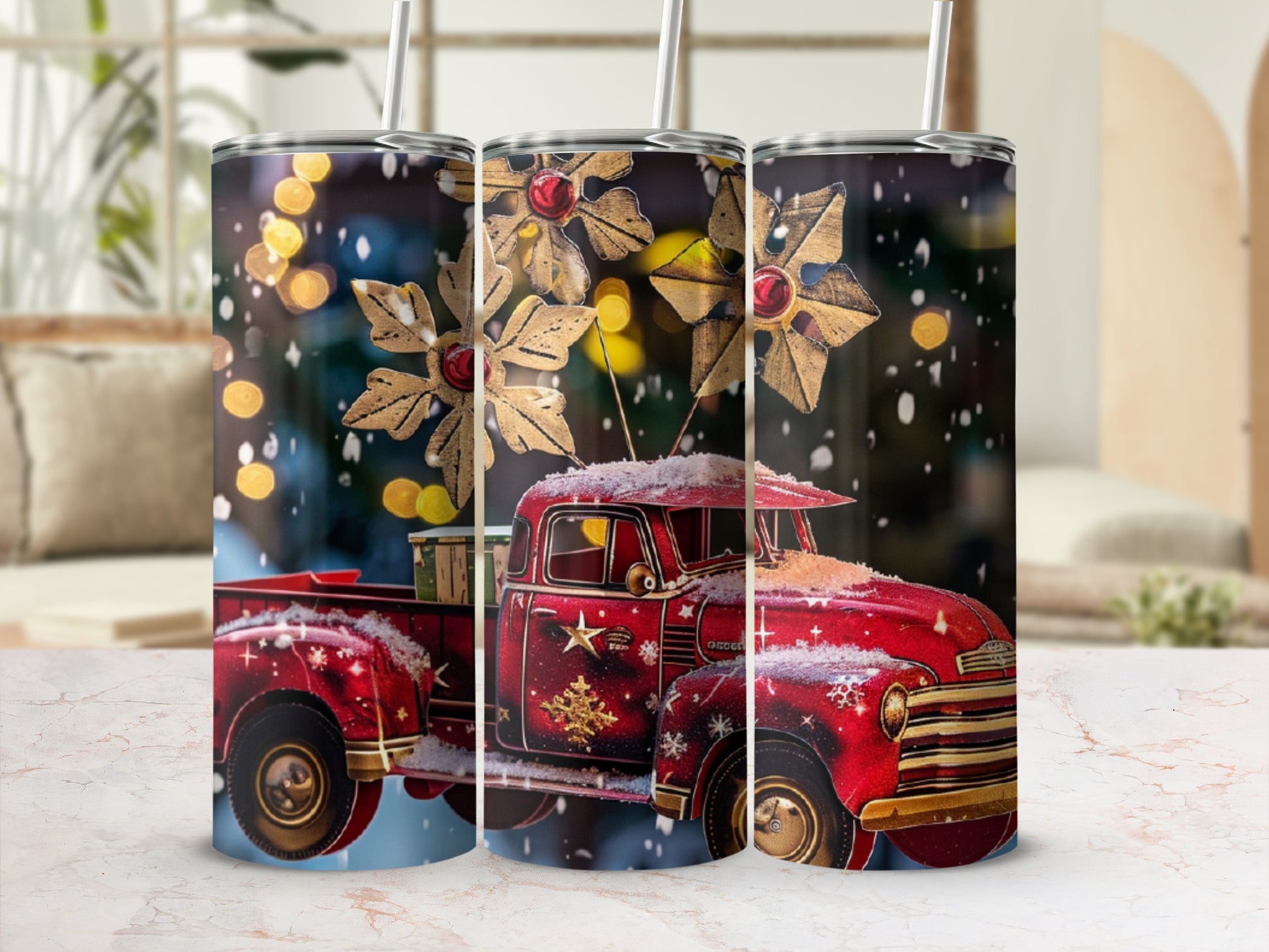 Red vintage truck with snowflakes and gold star ornaments on tumbler cups.