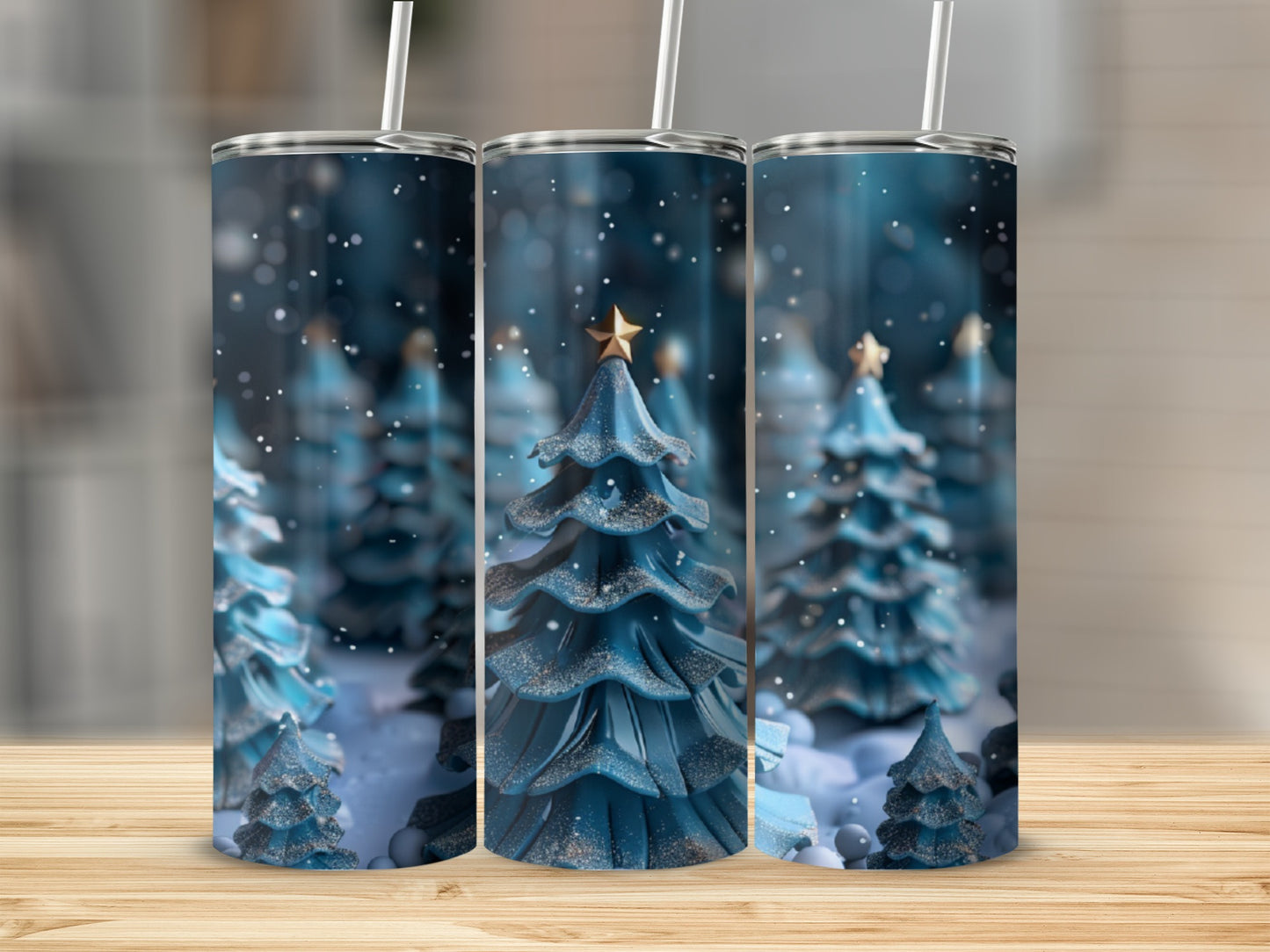 Three blue Christmas trees with gold stars on a snowy background.