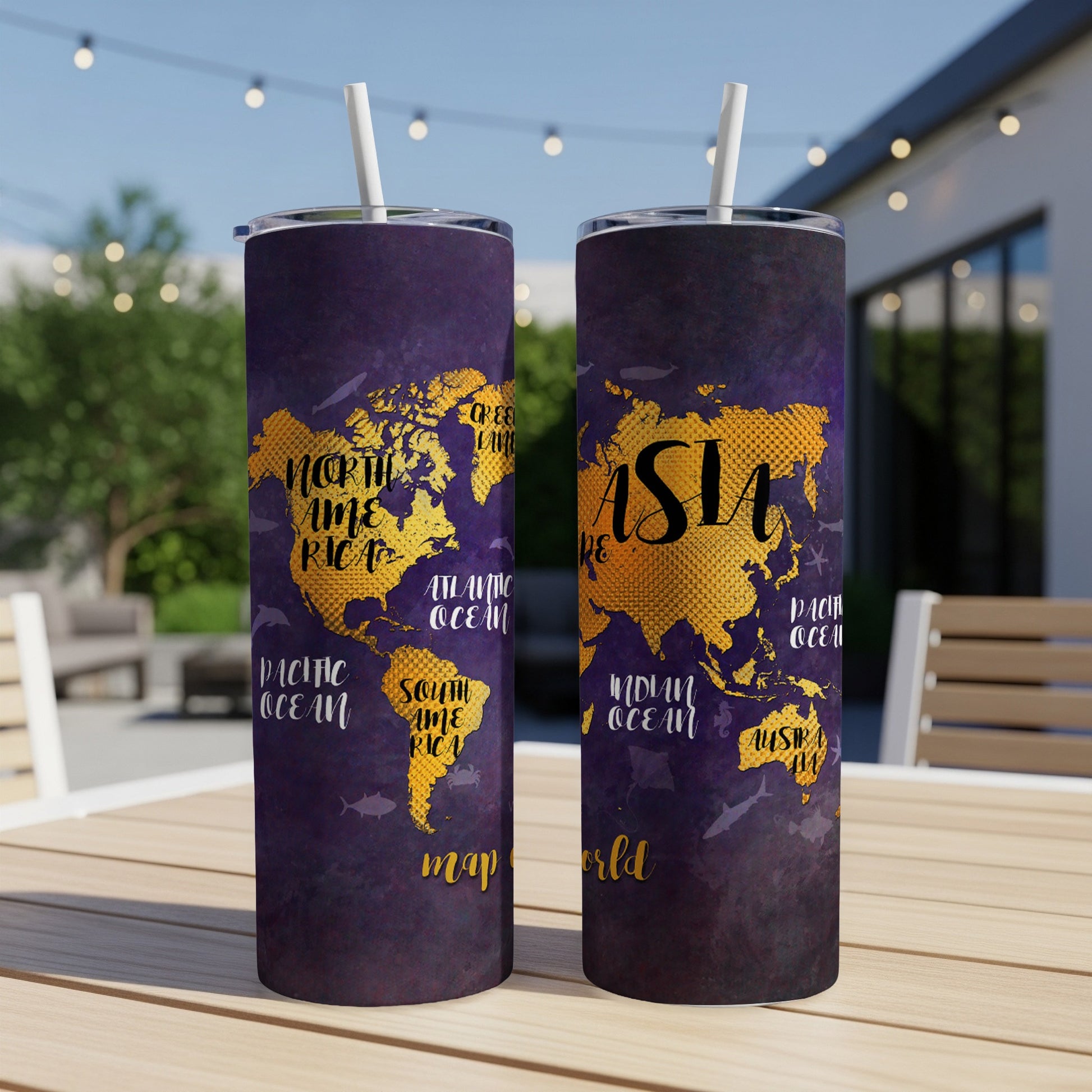 Two tumblers with a gold world map and sea creatures on a dark purple background.