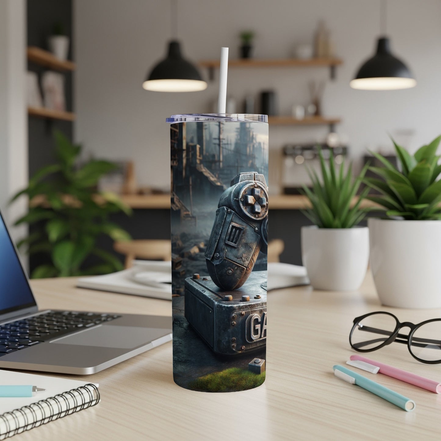 Tumbler with a gaming controller design against a blurred apartment background.