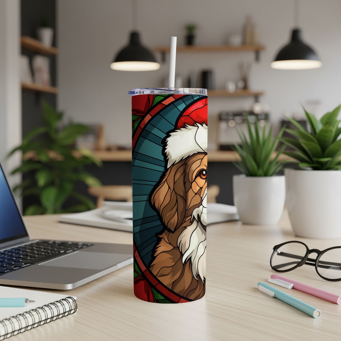 Dog wearing Santa hat on a Christmas-themed tumbler.