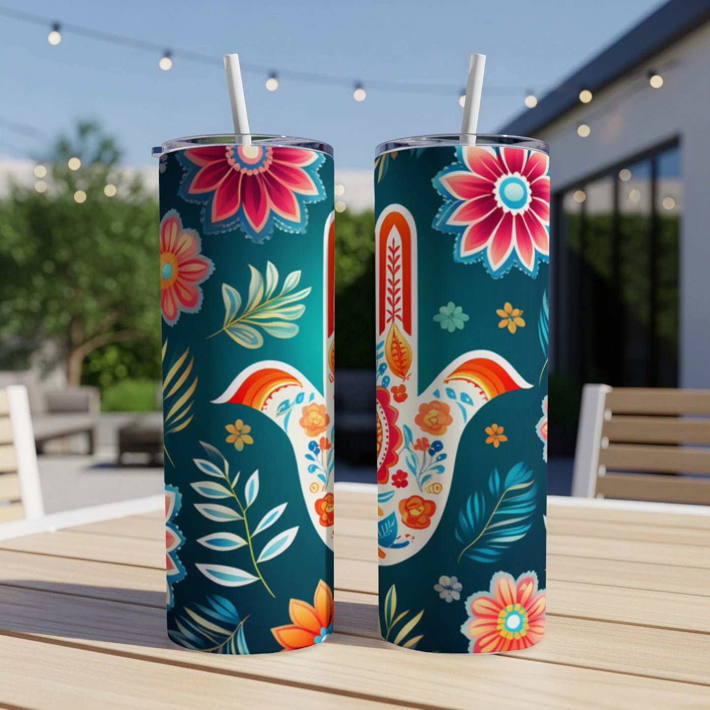 Two dark teal tumblers featuring a vibrant Hamsa hand design with colorful floral accents.
