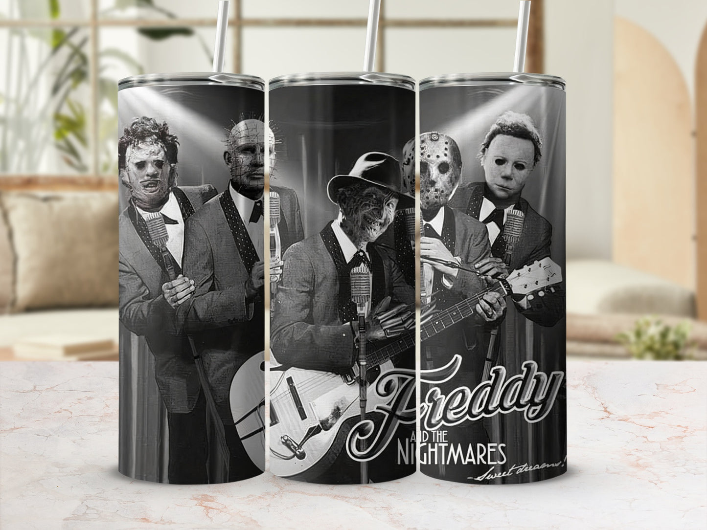 Tumbler with Freddy and the Nightmares band graphic and horror characters.