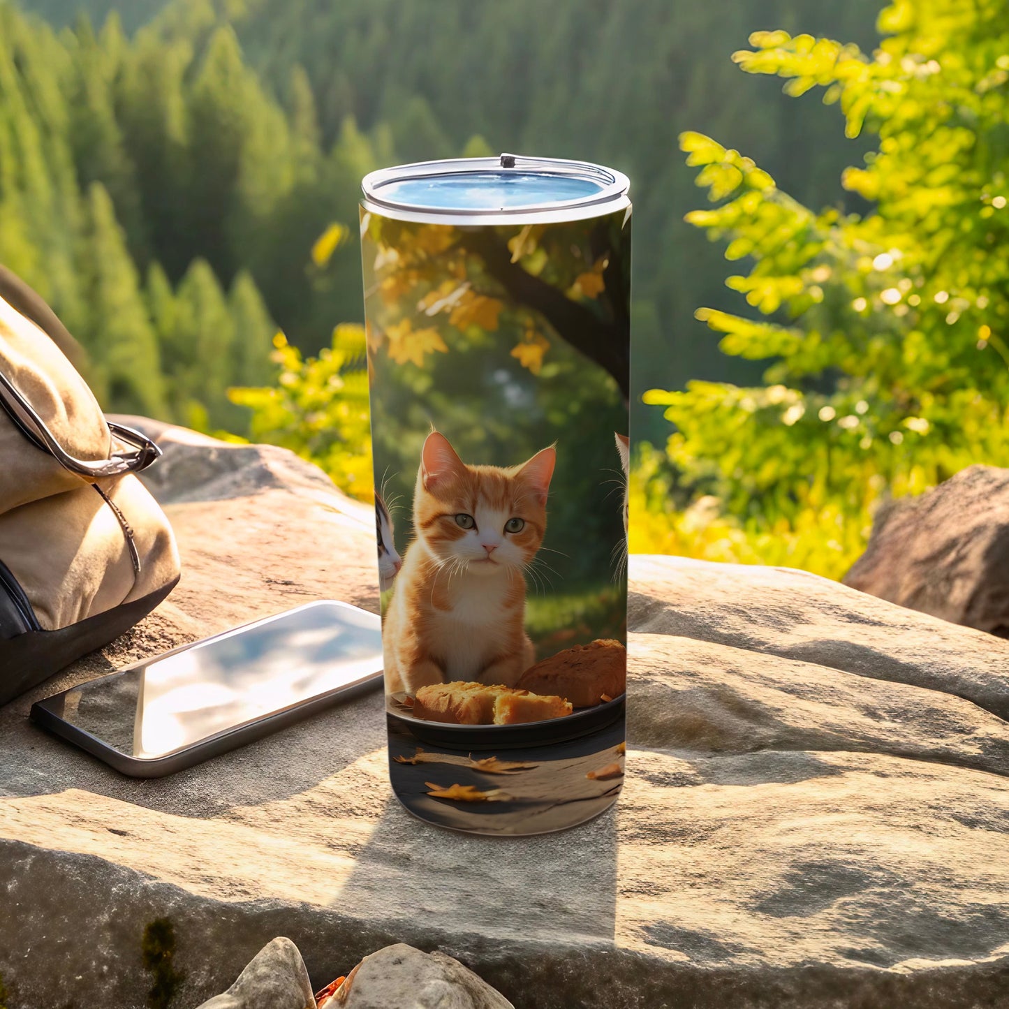 Tumbler with a tabby cat peering out of a basket.